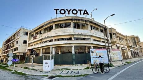 Abandoned European city where car showrooms and banks gather dust