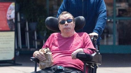 Tim Curry seen on rare outing with carer 13 years after suffering a stroke
