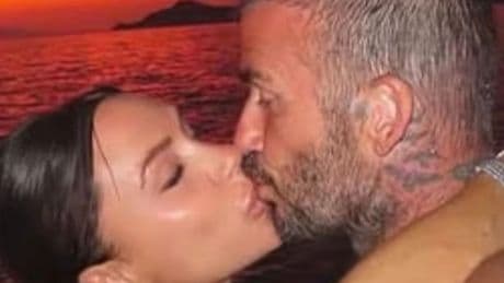 Victoria Beckham plants kisses on husband David ahead of his 50th birthday party