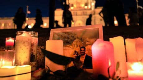 Photos of candlelight vigil honoring slain Minnesota lawmaker and her husband