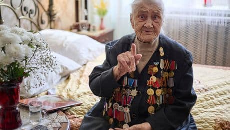 AP PHOTOS: On Victory Day, veterans recall the Soviet Union's sacrifice in World War II