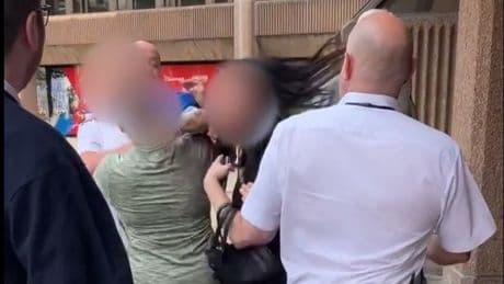 Woman ragged by her hair as brawl erupts outside court with blows traded