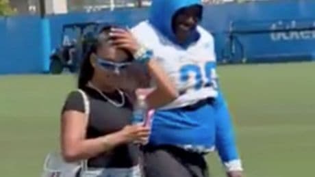 Fans let Chargers player have it after he brings girlfriend to camp