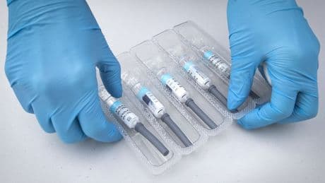 Vaccines helped avert hospital flu crisis, figures suggest