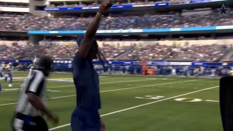 Cowboys star CeeDee Lamb takes big hit from sprinting official while on sideline