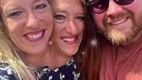 Reality TV star conjoined twins Abby and Brittany Hensel spotted with newborn baby