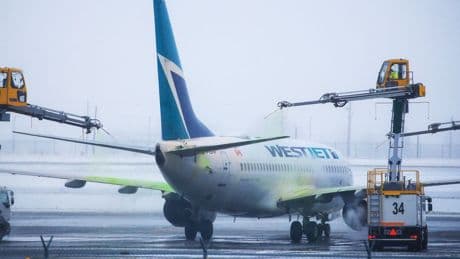 WestJet must pay $2K for cancelled flights after B.C. tribunal rejects airline's 'highly technical' evidence
