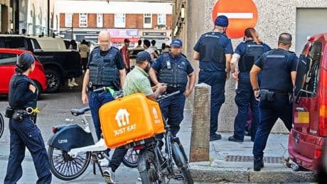 Illegal Channel migrant delivery riders ARRESTED as cops swoop on major asylum hotel after Sun exposé