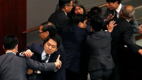 Hong Kong democracy activist granted asylum after fleeing to Australia
