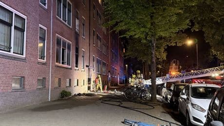 Grote brand in woning Rotterdam, acht huizen ontruimd