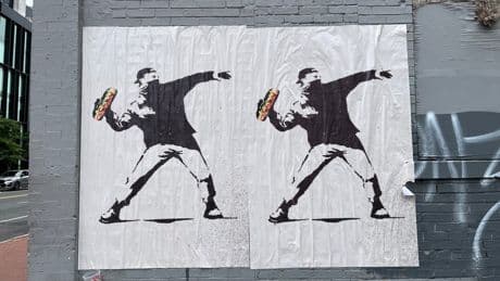 Federal agents arrested a protester for throwing a sandwich at them. Now artists are turning him into a resistance icon on the walls of DC