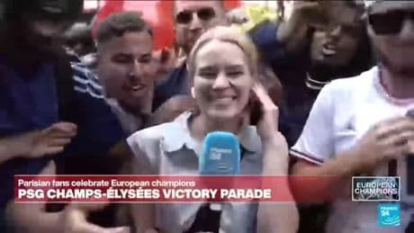 Selina Sykes reporting live on les Champs-Elysées for France24