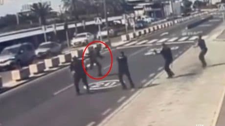 Horror moment knifeman is shot dead at top Brit holiday airport after threatening terrified tourists and lunging at cops