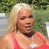 Lizzo channels Baywatch era Pamela Anderson in iconic red swimsuit after sharing 'truth' about her weight loss
