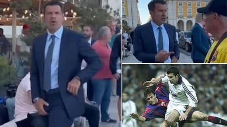 Luis Figo directs X-rated gesture at Barcelona supporter who called him a 'traitor' in tense moment 25 years after controversial move to Real Madrid