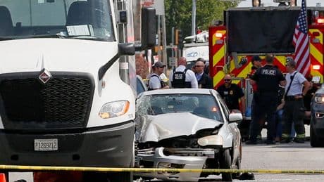 ICE agent shoots dead man who tried to run him over during operation ‘Midway Blitz’