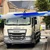 Woman, 89, is killed by recycling lorry 'while standing on street': Driver is arrested on suspicion of dangerous driving