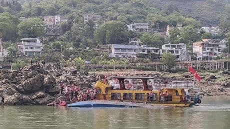 2 boats capsized in China's southwest after sudden storm, leaving 20 missing