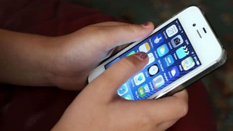 Primary school pupils using screens for tests is ‘normalising’ use, Tories claim