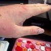 Hotel guest who was bitten 30 times by bed bugs in infested room tells how she woke up to see them 'crawling on the bed'