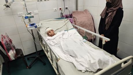 Gazan doctor receives the charred remains of nine of her 10 children after Israeli bombing