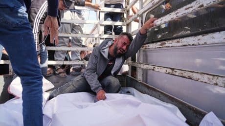 At least 23 people killed by Israeli strikes in Gaza as Israel lets minimal aid in