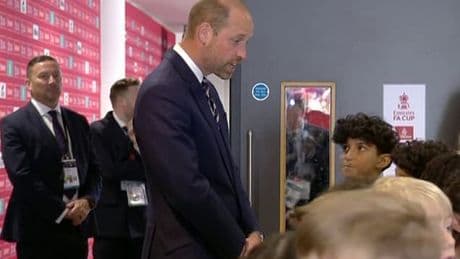 William's bitter-sweet moment: Prince greets players on the pitch at the FA Cup final... after his team Aston Villa were knocked out in the semi