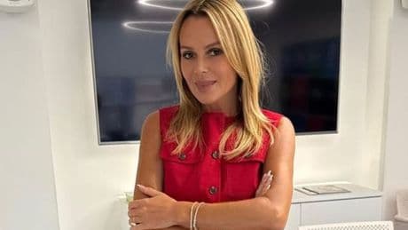 Amanda Holden is radiant in red linen co-ord that solves summer officewear dilemma