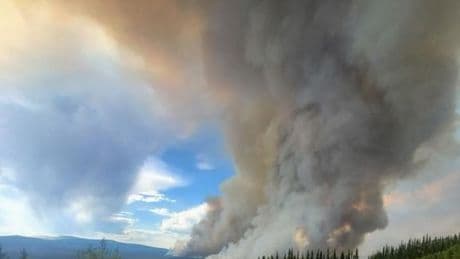 Nearly 200 homes on alert for Yukon wildfires as early season heat event hits