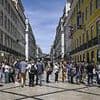 Panic grips blackout stricken Spain as residents are told to stay indoors, huge queues form for food and petrol - and it could take TEN HOURS to restore power