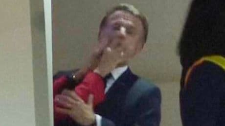 Video shows Macron being pushed in face by wife