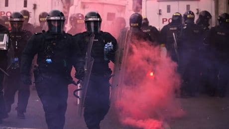 Young alleged rioter 'shot in the balls' with baton round, court hears