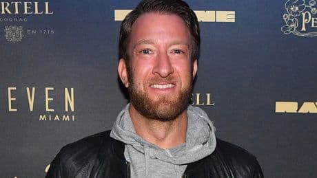 Barstool Sports founder retracts Auschwitz tour offer to customer in antisemitic sign incident