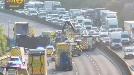 Severe delays on M25 and sections closed after waste lorry overturns
