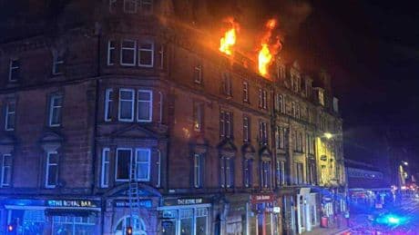 Man dies and girl in hospital after fire