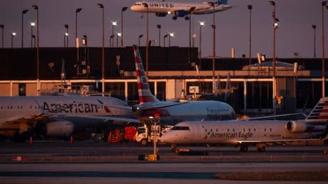 Thunderstorms over Chicago caused dozens of flights to divert, including one that took 3 attempts to land
