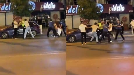 İzmir'in göbeğinde şehir eşkıyaları kendilerine ceza yazan trafik polisine tekme tokat saldırdı!