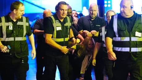 Climate protesters removed from Reform conference after heckling Nigel Farage