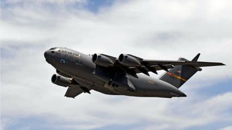 Huge US warplane touches down at Glasgow Airport after being spotted over city