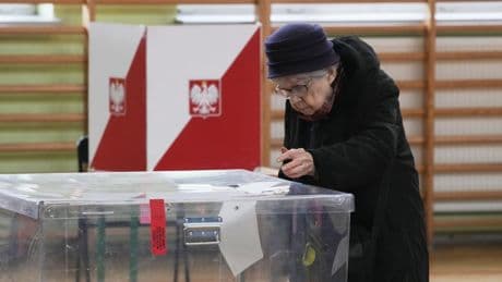 Poles vote for a new president as security concerns loom large