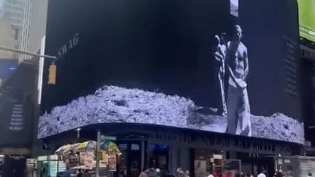 Justin Bieber teases surprise album with huge billboard in Times Square