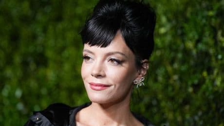Lily Allen wears diamond band on her ring finger after emotional admission about ex