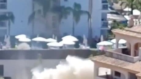 Horror moment huge pipe EXPLODES near Brit tourists’ balconies on Costa Del Sol before urgent beach warning