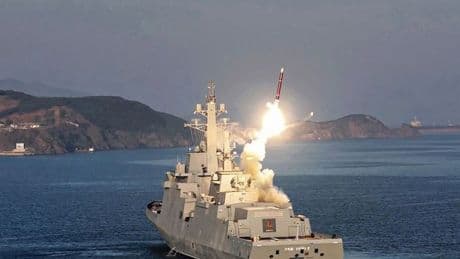 North Korea's Kim Jong Un oversees missile test of new 'Aegis Destroyer' warship