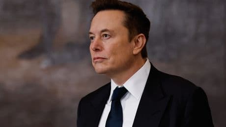Elon Musk says Tesla robotaxis will be geo-fenced and avoid some intersections after being asked about FSD running a red light