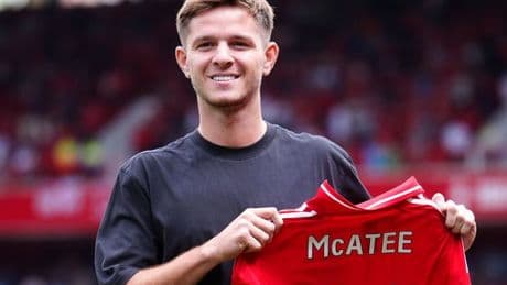 James McAtee pictured signing for Nottingham Forest with disgraced ex-agent jailed for nine years