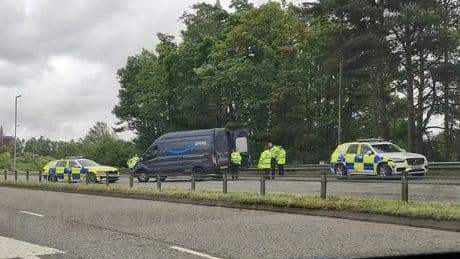 Man charged after 'stolen' Amazon van crashes with police car after chase