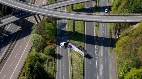 Man charged over horror M90 lorry crash after HGV fell from flyover