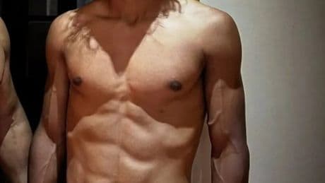 Nepo baby with very famous I’m A Celeb star dad shows off his ripped six pack – but can you guess who he is?