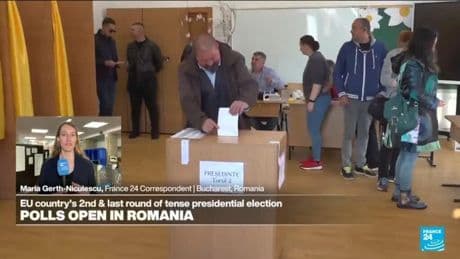 Polls open in Romania for a tense presidential runoff that pits nationalist against pro-EU centrist